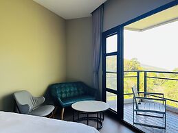 Xi Tou in Sunny Day Inn