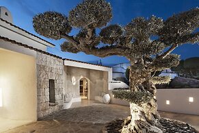 Sulia House Porto Rotondo, Curio Collection by Hilton