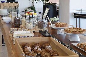 Sulia House Porto Rotondo, Curio Collection by Hilton