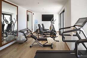 Sulia House Porto Rotondo, Curio Collection by Hilton