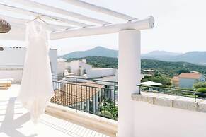 Sulia House Porto Rotondo, Curio Collection by Hilton