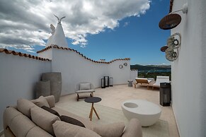 Sulia House Porto Rotondo, Curio Collection by Hilton