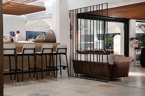 Sulia House Porto Rotondo, Curio Collection by Hilton