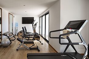 Sulia House Porto Rotondo, Curio Collection by Hilton