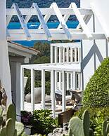 Sulia House Porto Rotondo, Curio Collection by Hilton