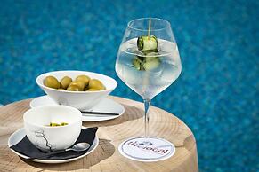 Sulia House Porto Rotondo, Curio Collection by Hilton