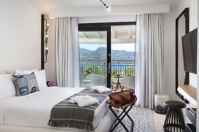 Sulia House Porto Rotondo, Curio Collection by Hilton