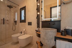 Sulia House Porto Rotondo, Curio Collection by Hilton