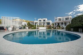 Sulia House Porto Rotondo, Curio Collection by Hilton