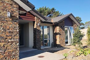 Modern Coastal Home & Award-winning Golf
