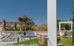 White Canvas Boutique Studios