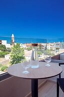 The City Hotel & Suites