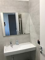 Feel at Home Apartments & Rooms