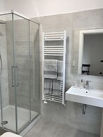 Feel at Home Apartments & Rooms