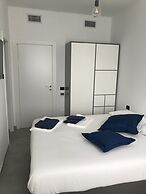 Feel at Home Apartments & Rooms