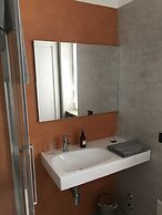 Feel at Home Apartments & Rooms