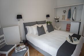 Living near Acropolis by Sylvia Staikou