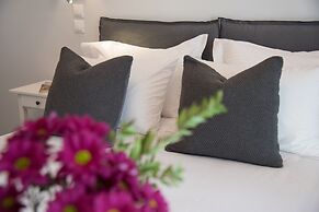 Living near Acropolis by Sylvia Staikou