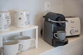 Living near Acropolis by Sylvia Staikou