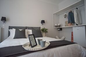 Living near Acropolis by Sylvia Staikou