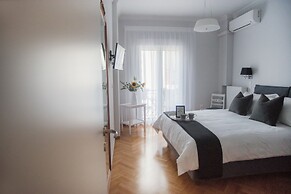 Living near Acropolis by Sylvia Staikou