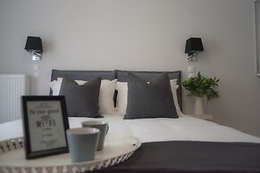 Living near Acropolis by Sylvia Staikou