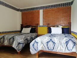 Hotel y Suites Axolotl