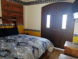 Hotel y Suites Axolotl