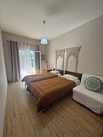 Olive Garden Studios & Apts