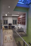 Tripodon Plaka in the shade of Acropolis by GHH