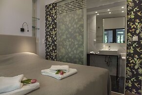 Tripodon Plaka in the shade of Acropolis by GHH