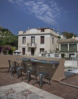 Tripodon Plaka in the shade of Acropolis by GHH