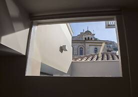 Tripodon Plaka in the shade of Acropolis by GHH