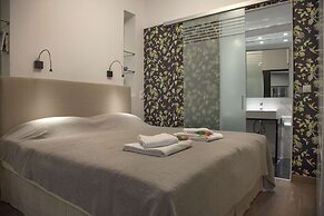 Tripodon Plaka in the shade of Acropolis by GHH