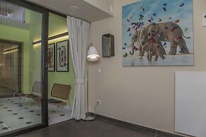 Tripodon Plaka in the shade of Acropolis by GHH