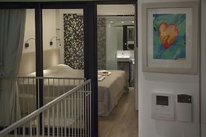 Tripodon Plaka in the shade of Acropolis by GHH