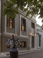 Tripodon Plaka in the shade of Acropolis by GHH