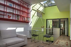 Tripodon Plaka in the shade of Acropolis by GHH