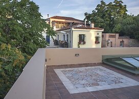 Tripodon Plaka in the shade of Acropolis by GHH