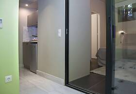 Tripodon Plaka in the shade of Acropolis by GHH