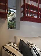 Tripodon Plaka in the shade of Acropolis by GHH