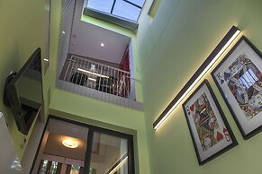 Tripodon Plaka in the shade of Acropolis by GHH