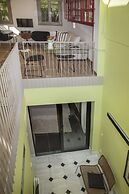 Tripodon Plaka in the shade of Acropolis by GHH