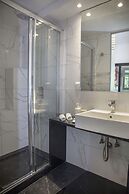 Tripodon Plaka in the shade of Acropolis by GHH