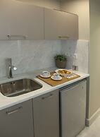 Tripodon Plaka in the shade of Acropolis by GHH