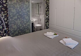 Tripodon Plaka in the shade of Acropolis by GHH