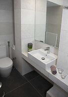 Tripodon Plaka in the shade of Acropolis by GHH