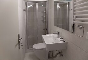 Tripodon Plaka in the shade of Acropolis by GHH