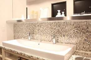 hostel & powder room crane - Caters to Women