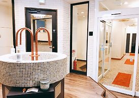 hostel & powder room crane - Caters to Women